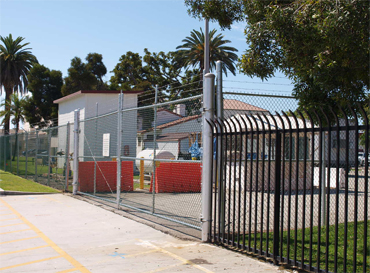 Large fence construction surrounding structure